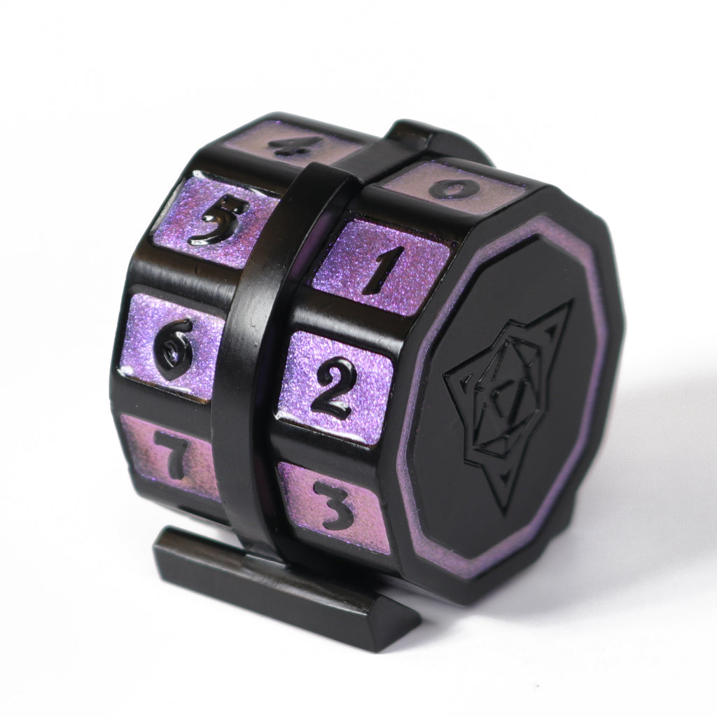 metal life counter for TCGs with matte-black plating and a shimmery purple inlay